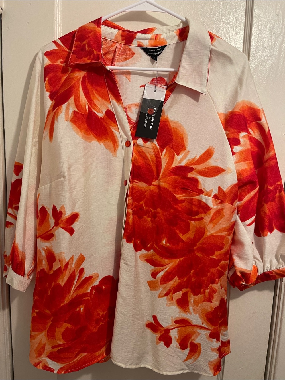 Unique Spectrum Cream Blouse with Orange and Red Floral Accents (item 71)